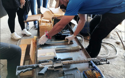  Firearms, ammo seized at compound allegedly owned by ex-guv