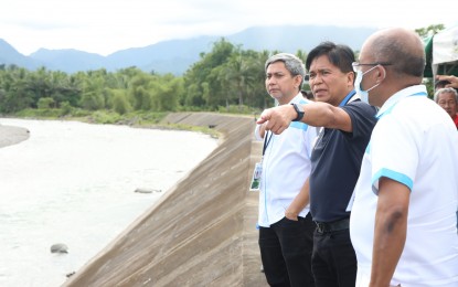 <p><strong>UP FOR REHAB.</strong> National Irrigation Administration (NIA) Acting Administrator Eddie Guillen (center) checks the Tingib Dam of the Binahaan River Irrigation System in Pastrana, Leyte on Thursday (March 23, 2023). NIA has bared its plan to rehabilitate the 60-year-old dam. <em>(Photo courtesy of NIA)</em></p>
