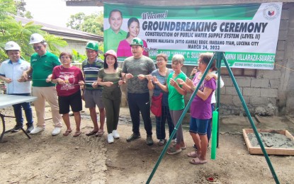<p><strong>CLEAN WATER</strong>. Residents of Sitio Kurba in Barangay Ibabang Iyam, Lucena City will soon have a steady supply of clean and potable water through a project funded by the office of Quezon 2nd District Rep. David Suarez (fourth from right). The lawmaker and local government officials broke ground for the project on Friday (March 24, 2023). <em>(PNA photo by Belinda Otordoz)</em></p>