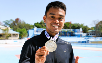<p><strong>CHAMP.</strong> Mark Harry Diones wins the men's open triple jump event in the ICTSI Philippine Athletics Championships at Ilagan City Sports Complex, Isabela province on Sunday (March 26, 2023). He jumped 15.81 meters, but it was way below the 16.70m national record he set in the 2017 edition. <em>(Courtesy of PATAFA)</em></p>