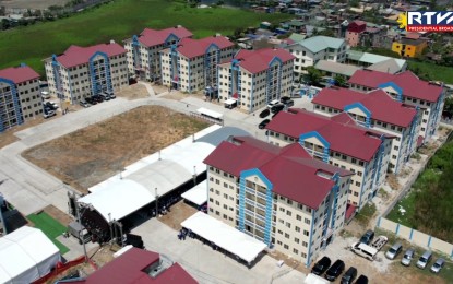 <p>St. Gregory Homes resettlement project with 1,380 residential units built in Malabon City. <em>(Screengrab from RTVM)</em></p>