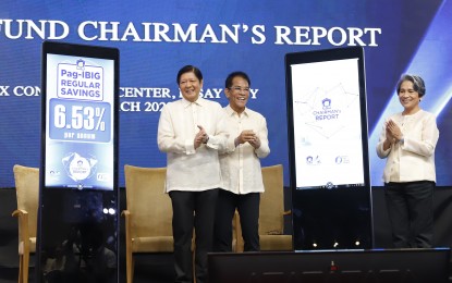 <p><strong>HOUSING BACKLOG</strong>. President Ferdinand R. Marcos Jr. (left) graces the Pag-IBIG Fund Chairman’s Report for the unveiling of the Agency’s 2022 performance and the dividend rates on the members’ savings at the SMX Convention Center in Pasay City on Tuesday (March 28, 2023). Marcos called on the Department of Human Settlements and Urban Development to assist concerned agencies in addressing the housing backlog of more than 6.5 million. Also in photo are Pag-IBIG Fund Board of Trustees Secretary Jose Rizalino L. Acuzar (center) and Chief Executive Officer (CEO) Marilene C. Acosta. <em>(PNA photo by Alfred Frias)</em></p>