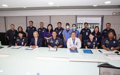 <p><strong>PARTNERSHIP.</strong> Officials of the Philippine National Police and the Makati Medical Center Foundation pose for a photo opportunity after the signing of a memorandum of agreement in Makati City on Tuesday (March 28, 2023). The pact aims to strengthen the organizational capacity of police hospitals and medical treatment facilities and improve the quality of health care services for PNP personnel and their families. <em>(Photo courtesy of PNP Public Information Office)</em></p>