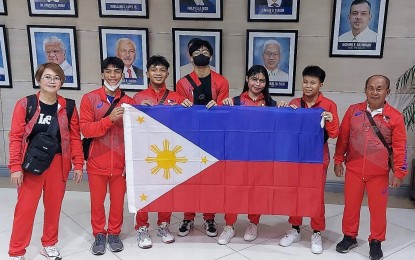 <p><strong>TRIUMPHANT.</strong> A group photo of the national team which participated in the World Youth Weightlifting Championships in Durres, Albania on March 21-27, 2023. The victorious team (from left) are Coach Diwa Delos Santos, Eron Borres, Prince Keil Delos Santos, Albert Ian Delos Santos, Rosalinda Faustino, Angeline Colonia and Coach Gregorio Colonia. <em>(Contributed photo)</em></p>