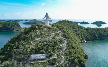 <p><strong>PILGRIMAGE ISLAND</strong>. An aerial view of the "Pilgrimage Island" at the Hundred Islands National Park in Alaminos, Pangasinan. It features Stations of the Cross with life-sized statues and a 263-step staircase leading to the famous 55-foot-tall Christ the Savior statue, making it an attraction all year round. <em>(Photo courtesy of DOT Region 1 Facebook page)</em></p>