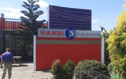 <p><strong>SCENE OF THE CRIME</strong>. The façade of the restobar where the commotion that led to the death of a policeman and injuries of two others from the 2nd Negros Occidental Provincial Mobile Force Company took place early morning on Friday (March 31, 2023). Two civilians also died while another was wounded.<em> (Photo courtesy of Nonie Flores)</em></p>