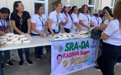 <p><strong>AFFORDABLE SUGAR.</strong> Personnel of Bacolod City Cooperative and Livelihood Development Office sell Kadiwa sugar supplied by Victorias Milling Company at PHP70 per kilo during the launching of the program at the Government Center on Monday (April 3, 2023). The city government has partnered with the Sugar Regulatory Administration to initiate the selling of cheaper refined sugar for households in Bacolod. <em>(Photo courtesy of Bacolod City PIO)</em></p>