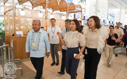 <p><strong>NAIA MODERNIZATION.</strong> Transportation Secretary Jaime Bautista (left to right in foreground), Department of Tourism (DOT) Secretary Christina Frasco and DOT Undersecretary Shereen Pamintuan during an inspection at NAIA Terminal 2 on April 4, 2023. Bautista said NAIA's privatization will not only improve and modernize the airport but also boost the country's economy during the NAIA Public-Private Partnership (PPP) pre-bid conference on Friday (Sept. 22, 2023).<em> (Photo courtesy of DOT)</em></p>