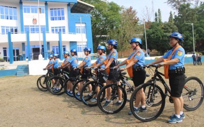 <p><strong>KEEPING THE PEACE. </strong>A group of all-women tourist police bike patrollers gets ready to assist visitors in Ilocos Norte on April 3, 2023. Findings from a Tugon ng Masa Survey by OCTA Research released Thursday (May 18, 2023) has shown that 80 percent of Filipinos trust the Philippine National Police in keeping peace in the coutry. <em>(Photo courtesy of the Ilocos Norte Police Provincial Office)</em></p>