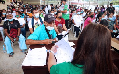 <p><strong>AID FOR SENIORS.</strong> About 900 senior citizens in Sta. Maria, Davao Occidental receive cash cards containing PHP5,600 from the Department of Social Welfare and Development on April 4, 2023. The Department of Budget and Management said Thursday (Aug. 10, 2023) the Marcos administration has allotted PHP49.81 billion for the social pension of indigent senior citizens in the proposed 2024 national budget. <em>(PNA file photo by Robinson Niñal Jr.)</em></p>