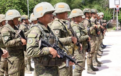 <p><strong>WITNESSES' SAFETY.</strong> Soldiers from an Army battalion in Negros Oriental listen attentively as they were given instructions in this undated photo. Visayas Command chief Lt. General Benedict Arevalo assured the safety of witnesses who would cooperate with government investigation on the series of killings in Negros Oriental. <em>(File photo courtesy of Viscom PIO)</em></p>