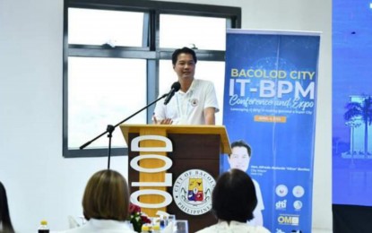 <p><strong>SUPPORT</strong>. Bacolod City Mayor Alfredo Abelardo Benitez speaks during the IT-BPM Conference and Expo held at Robinsons Cybergate Bacolod 2 on Tuesday (April 4, 2023). “I ensure this sector that the city will continuously work in providing reliable power for our business process outsourcing companies and strengthen the department to attend to the needs of the industry,” he said.<em> (Photo from Albee Benitez Facebook page)</em></p>