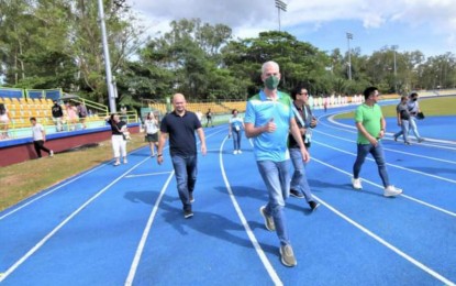 <p><strong>NEW LOOK</strong>. Negros Occidental Governor Eugenio Jose Lacson (center) leads the inauguration of the newly-renovated Panaad Stadium football field and track oval in Bacolod City on March 31, 2023. The province, which has hosted the Palarong Pambansa five times since the 1970s, is bidding anew to host the country’s largest amateur games in 2024. <em>(Photo courtesy of PIO Negros Occidental)</em></p>