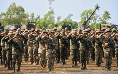 <p><strong>'SALAKNIB' 2023 ENDS.</strong> Philippine Army and US Army Pacific soldiers salute during the closing ceremony of 2023 "Salaknib" exercises at the 7th Infantry Division Parade Grounds in Fort Magsaysay, Nueva Ecija on Tuesday (April 4, 2023). "Salaknib", which means shield in Ilocano, is an annual Army-to-Army exercise geared at strengthening the interoperability of Filipino and American soldiers in various military operations. <em>(Photo courtesy of Philippine Army)</em></p>