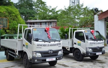 <p><strong>AGRIBUSINESS</strong>. The two trucks donated by the Department of Agrarian Reform to two agrarian reform beneficiaries’ organizations in Leyte province. The assistance, which was turned over Tuesday (April 4, 2023), aims to provide promising business opportunities to the recipients. <em>(Photo courtesy of DAR-Eastern Visayas)</em></p>