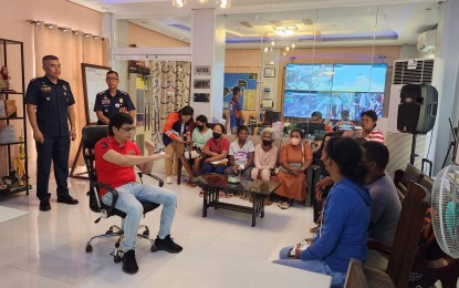 <p><strong>SEARCH FOR MISSING IP CHIEFTAIN</strong>. Interior Secretary Benjamin “Benhur” Abalos Jr. (seated, in red shirt) on Friday (April 7, 2023) meets with the family of the missing chieftain of the Malay Ati Tribal Association who was thrown off a motorized fishing boat that was hit by a speedboat between the waters of mainland Malay and Boracay Island on Wednesday evening (April 5). Abalos joined local and foreign scuba divers in the conduct of scuba search operations on Saturday (April 8). <em>(Photo by Malay Municipal Police Station)</em></p>