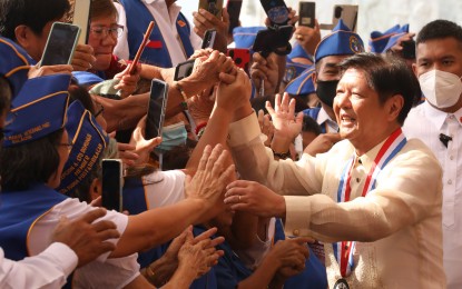 <p><strong>SUPPORT FOR WWII VETERANS.</strong> President Ferdinand R. Marcos Jr. mingles with World War II veterans at the commemoration of the 81st Araw ng Kagitingan (Day of Valor) at Mount Samat National Shrine in Pilar, Bataan on Monday (April 10, 2023). Marcos said the government is working to finds ways on how to give additional support to the country’s war veterans who have been asking for more support from the administration through a pension hike.<em> (PNA photo by Rey Baniquet)</em></p>