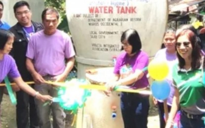 <p><strong>WATER FACILITY.</strong> The inauguration of the Community-Managed Potable Water Supply Sanitation and Hygiene project in Kapitan Ramon in Silay City, Negros Occidental province on March 30, 2023. As of Tuesday (April 11), 58 members of the agrarian reform beneficiary organizations and their families, as well as 403 students, are benefiting from the project.<em> (Photo courtesy of DAR-Negros Occidental I)</em></p>