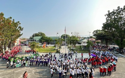 <p><strong>NO TOPLESS</strong>. People gather at the Solsona plaza in Ilocos Norte for a fiesta celebration in this file photo. Effective this month, the Solsona government now prohibits half-naked persons wandering around public places in the municipality for decency. <em>(File photo courtesy of the Solsona LGU)</em></p>