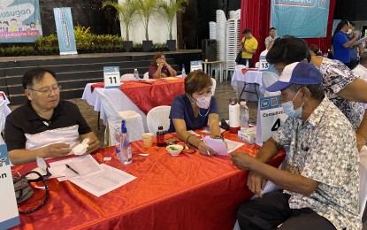 <p><strong>MEDICAL CONSULTATION</strong>. A senior citizen seeks medical consultation on Thursday (April 13, 2023) at the Laoag City Centennial Arena. About 500 residents became beneficiaries during the whole-day medical mission sponsored by Watsons with the help of healthcare volunteers. <em>(Photo by Leilanie Adriano)</em></p>