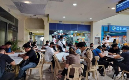 <p><strong>JOB OPENINGS</strong>. Applicants during the first day of the two-day job fair organized by the Bacolod City Public Employment Services Office and the Department of Labor and Employment at Robinsons Place Bacolod on Friday (April 14, 2023). Some 6,760 job openings are available from 55 participating companies. <em>(Photo courtesy of Bacolod City PIO)</em></p>