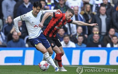 <p><strong>MAKING KOREA PROUD.</strong> Son Heung-min of Tottenham Hotspur (left) and Ryan Christie of AFC Bournemouth battle for the ball during a Premier League match at Tottenham Hotspur Stadium in London on April 15, 2023. Son has now scored 101 Premier League goals, the first Asian to reach the century mark.<em> (EPA via Yonhap)</em></p>