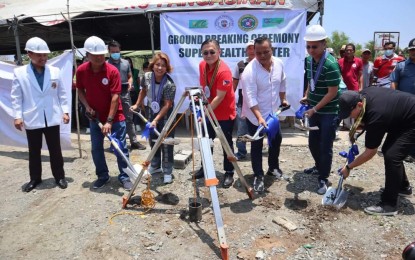 <p><strong>GROUNDBREAKING</strong>. Senator Christopher Lawrence Go (middle), chairman of the Committee on Health in the Senate, and other officials pose during a groundbreaking ceremony for a Super Health Center in Barangay San Vicente Umingan, Pangasinan on Tuesday (April 18, 2023). This is the ninth center to be constructed in the province funded in 2022. <em>(Photo courtesy of Senator Bong Go Facebook page)</em></p>