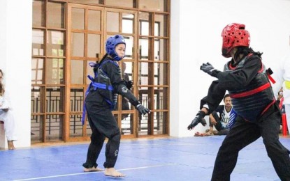 <p><span style="color: #0e101a; background: transparent; margin-top: 0pt; margin-bottom: 0pt;" data-preserver-spaces="true">GETTING READY. Athletes compete in pencak silat during the Antique Provincial Athletic Association Meet Association in San Jose de Buenavista on April 2, 2023, in preparation for the regional sports meet. Evelyn Remo, chief of the Department of Education Schools - Division of Antique School Governance and Operations Division, said in an interview Tuesday (April 18, 2023) that they have enough budget for the Western Visayas Regional Athletic Association Meet to be held in Aklan province on April 26 to 30. (Courtesy of Antique-PIO)</span></p>