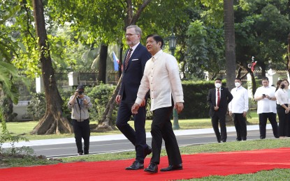 <p><strong>OFFICIAL VISIT.</strong> President Ferdinand R. Marcos Jr. (right) and Prime Minister Petr Fiala of the Czech Republic walk around the Kalayaan Grounds of Malacañan Palace, Manila on April 17, 2023. The two leaders previously met in Brussels, Belgium in December 2022 on the sidelines of the Association of Southeast Asian Nations - European Union Commemorative Summit, where they discussed cooperation in security, particularly the modernization program of the Armed Forces of the Philippines.<em> (PNA photo by Alfred Frias)</em></p>