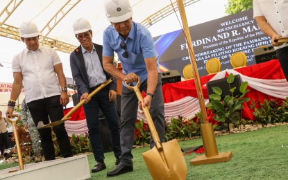 <p><strong>PAMBANSANG PABAHAY.</strong> President Ferdinand R. Marcos Jr. (in blue) leads the groundbreaking ceremony of a housing project under the Pambansang Pabahay Para sa Pilipino housing program in Heroes Ville, Barangay Gaya-Gaya, City of San Jose del Monte, Bulacan on April 19, 2023. The administration's flagship program aims to build a million housing units annually until 2028 to address the backlog of 6.5 million units. <em>(PNA file photo by Rey Baniquet)</em></p>