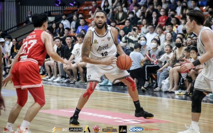 <p><strong>MVP.</strong> San Beda-Machateam's Jalen Robinson (center) takes a side step before making a shot to the basket in this undated photo. Robinson was named AsiaBasket Most Valuable Player. <em>(Photo courtesy of AsiaBasket)</em></p>