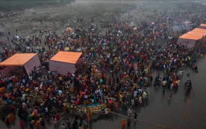 <p>Hindu devotees gather on the bank of river Yamuna to worship the Sun god during Chhath Parva Festival in Noida the outskirts of New Delhi, India on Oct. 31, 2022. <em>(Amarjeet Kumar Singh - Anadolu Agency)</em></p>