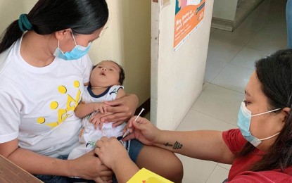 <p><strong>MASSIVE VACCINATION</strong>. A baby in Ilocos Norte gets vaccinated in this undated photo. A massive vaccination for children will be launched next month to protect children from such infectious diseases as measles and polio. <em>(Photo courtesy of DOH Center for Health Development Region 1)</em></p>