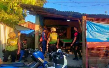 <p><strong>DISMANTLED.</strong> Anti-narcotic agents raid Wednesday (April 19, 2023) a suspected drug den at the back of a store in Barangay Salimbao, Sultan Kudarat, Maguindanao del Norte, resulting in the arrest of a police officer and seven others. In a separate operation on the same day, PDEA also nabbed five suspects inside a suspected drug den in the same town. <em>(Photo courtesy of PDEA-BARMM)</em></p>