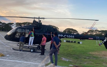 <p><strong>ACCOMPLICE.</strong> The National Bureau of Investigation releases a photo of the alleged getaway chopper used by some of the suspects in the assassination of Negros Oriental Governor Roel Degamo in Pamplona town on March 4, 2023. Justice Secretary Jesus Crispin Remulla said in a press briefing on Monday (April 24) that the chopper, reportedly owned by Negros Oriental 3<sup>rd</sup> District Rep. Arnolfo Teves, was found in a hangar in Dumaguete City.<em> (Courtesy of NBI)</em></p>