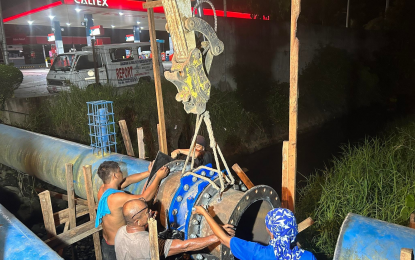 <p><strong>WATER MODERNIZATION.</strong> Workers of the Cagayan de Oro Water District (COWD) install a 600-mm.-diameter valve in Cagayan de Oro City sometime in March. The COWD management is proposing a PHP1.9 billion budget for its system modernization plans. <em>(Photo courtesy of COWD)</em></p>