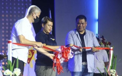 <p><strong>FESTIVAL OPENING</strong>. Vice President and Education Secretary Sara Duterte (center) leads the ribbon-cutting ceremony to mark the 41st Pasalamat Festival in La Carlota City, Negros Occidental on Monday night (April 24, 2023). She is joined by Governor Eugenio Jose Lacson (left) and Vice Governor Jeffrey Ferrer during the event, which was one of her many engagements during her day-long visit to the province. <em>(Photo courtesy of La Carlota City PIO)</em></p>