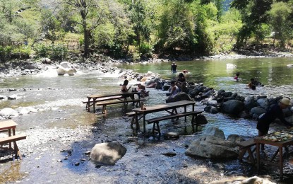 <p> </p>
<p><strong>TEEMING WITH WATER. </strong>Residents and tourists enjoy swimming in a river in Tibiao town, Antique province which is still teeming with water despite the very hot weather condition being experienced in the province. The Office of Provincial Agriculture said the  El Niño phenomenon is anticipated to have a negligible effect on farmers as the province is still experiencing sporadic rainfall, especially in the afternoon. <em>(Photo by Annabel Consuelo J. Petinglay)</em></p>