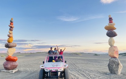 <p><strong>PAOAY SAND DUNES</strong>. Tourists enjoy a 4x4 ride at the Paoay sand dunes in Ilocos Norte in this undated photo. The tourist spot on May 13 and 14, 2023 will host the 10th Himala sa Buhangin, featuring art installations, music, food, and other fun-filled activities. <em>(PNA photo by Leilanie Adriano)</em></p>