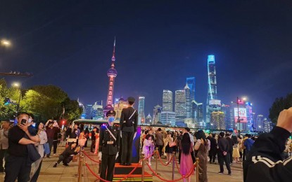 <p><strong>TRAVEL BOOM.</strong> Locals continue to travel to the different destinations and tourist attractions in China as shown in this April 18, 2023 photo at The Bund in Shanghai, China. The city is one of the tourism hotspots both for local and international guests. (<em>PNA photo by Liza T. Agoot)</em></p>
<p><em> </em></p>