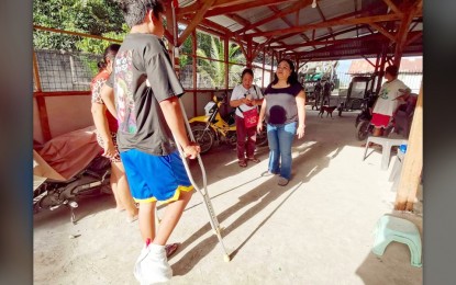 <p><strong>HEALING JOURNEY.</strong> A victim of the Pamplona massacre slowly makes his way forward in this photo taken in March. Negros Oriental’s Provincial Health Office will begin a series of psychological and stress debriefings for massacre survivors and victims' families to help them move forward from the gruesome killings, its chief Liland Estacion said on Thursday (April 27, 2023). <em>(PNA file photo by Judy Flores Partlow)</em></p>