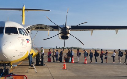 <p><strong>TOURISM REVIVAL.</strong> Passengers get onboard to an airline carrier at the tarmac of Laguindingan Airport, in Misamis Oriental on Thursday (April 27, 2023). Tourism in the Northern Mindanao region saw a 177 percent increase in 2022 following the easing of Covid-19 protocol restrictions. <em>(PNA photo by Nef Luczon)</em></p>