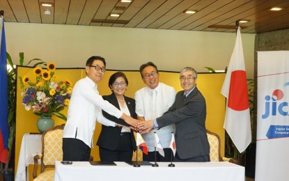 <p><strong>JOINING HANDS.</strong> Signatories ( left to right) Japanese Ambassador Kazuhiko Koshikawa, Mariano Marcos State University President Shirley Castañeda, Japan International Cooperation Agency Chief Representative to the Philippines Takema Sakamoto, and Takara President Kimio Takarada join hands after signing the minutes of their meeting at the ambassador's residence in Makati on Friday (April 28, 2023). The Japanese government is extending technology assistance for the improvement of black garlic production in Ilocos Norte, and agricultural production processes in the Philippines. <em>(Photo courtesy of JICA Philippines)</em></p>