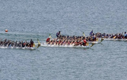 <p><strong>DRAGON BOAT RACE</strong>. Local and international rowers compete in a dragon boat race held at the Paoay Lake Natural Park in this undated photo. This year, the national leg of the Philippine Canoe Kayak Dragon Boat Federation competition will be held at the same site. <em>(Contributed Photo)</em></p>