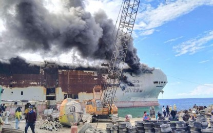 <p><strong>SHIP ON FIRE</strong>. MV Diamond Highway burns off the coast of Lapu-Lapu City, Cebu on Friday (April 28, 2023). The Bureau of Fire Protection declared a "fire out" on the burning ship early Saturday morning (April 29). <em>(Photo courtesy of Philippine Coast Guard)</em></p>