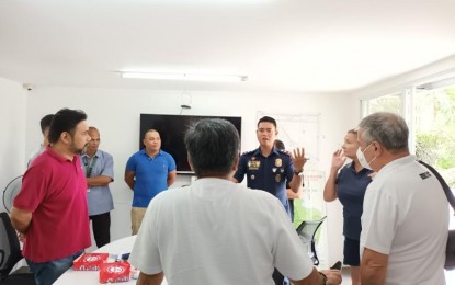 <p><strong>TEAM EFFORT</strong>. Antipolo police chief Lt. Col. June Paolo Abrazado updates homeowners on Saturday (April 29, 2023) on steps being taken to curb the spate of burglaries in exclusive villages. Community leaders assured they will work closely with the police.<em> (Contributed photo)</em></p>