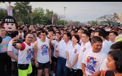 <p><strong>ALL-OUT WAR. </strong>Department of the Interior and Local Government Secretary Benhur Abalos (2nd from left) joins the fun run as part of the launch of the "Buhay Ingatan, Droga’y Ayawan" (BIDA) anti-illegal drugs program in Dagupan City, Pangasinan on Sunday (April 30, 2023). BIDA heeds the order of President Ferdinand R. Marcos Jr. to strengthen the government's anti-drug campaign by focusing on arresting drug lords, rehabilitating users and reducing demand. <em>(Screenshot from Mayor Belen Fernandez livestream)</em></p>