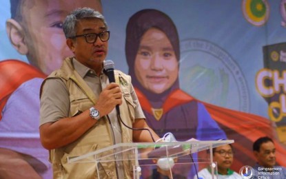 <p><strong>HIGH VAX COVERAGE.</strong> Health Undersecretary Dr. Abdullah Dumama Jr., assured parents in the Bangsamoro Autonomous Region in Muslim Mindanao that the anti-polio and measles vaccines are safe, effective and free. Dumama leads the launching of the vaccination drive in Cotabato City on Tuesday (May 2, 2023). The BARMM health office is targeting 626,000 children for the vaccination drive.<em> (Photo courtesy of MOH-BARMM)</em></p>