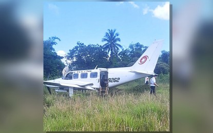 <p><strong>RUNWAY EXCURSION. </strong>A Piper PA-31-350 Navajo Chieftain aircraft overshoots the runway of Palanan Airport in Isabela around 10:13 a.m. Wednesday (May 3, 2023). The Civil Aviation Authority of the Philippines (CAAP) said the pilot and the eight passengers safely disembarked the plane. (<em>Photo courtesy of CAAP</em>) </p>