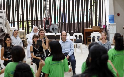 <p><strong>SHARING JOY.</strong> Israeli Ambassador to the Philippines Ilan Fluss (seated, center), his wife Gila (seated, extreme right), and drummers band Rhythmania watch the performance of the foster children housed at the Laura Vicuña Foundation, Inc. in Quezon City on Wednesday (May 3, 2023). The Israeli envoy’s orphanage visit was part of Israel's 75th Independence Day celebration in the Philippines. <em>(PNA photo by Joey O. Razon)</em></p>